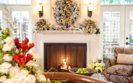 A fireplace in a festive room at Harbour House Hotel in Niagara-on-the-Lake.